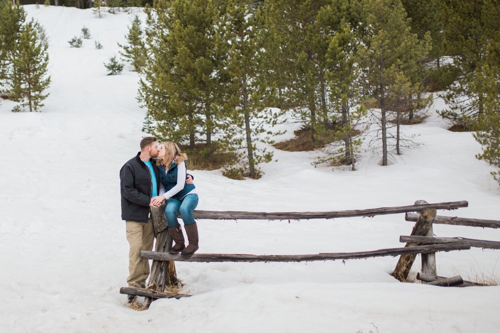 Lovely couple taking engagement photos in Conifer Colorado in January
